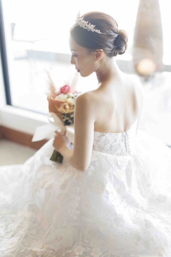 Elegant indoor portrait of bride at a luxury wedding venue in Okinawa, Japan
