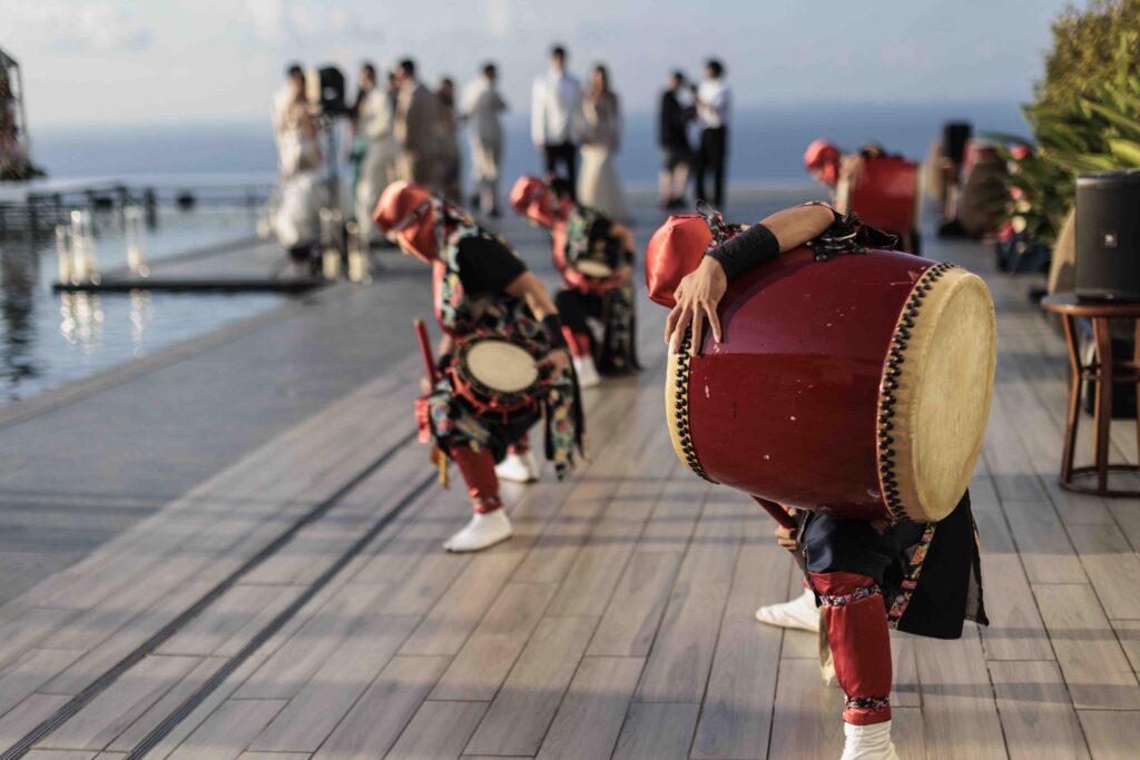 Traditional Okinawan cultural performance at a luxury destination wedding in Japan
