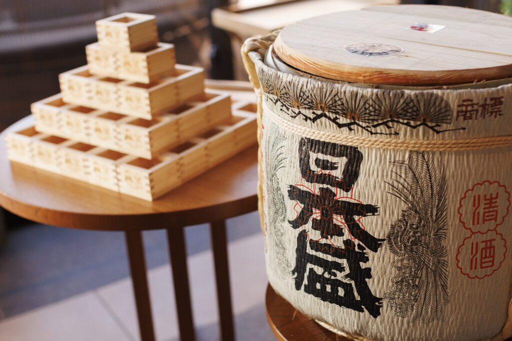 Kagami biraki sake barrel ceremony at an elegant indoor destination wedding in Okinawa, Japan
