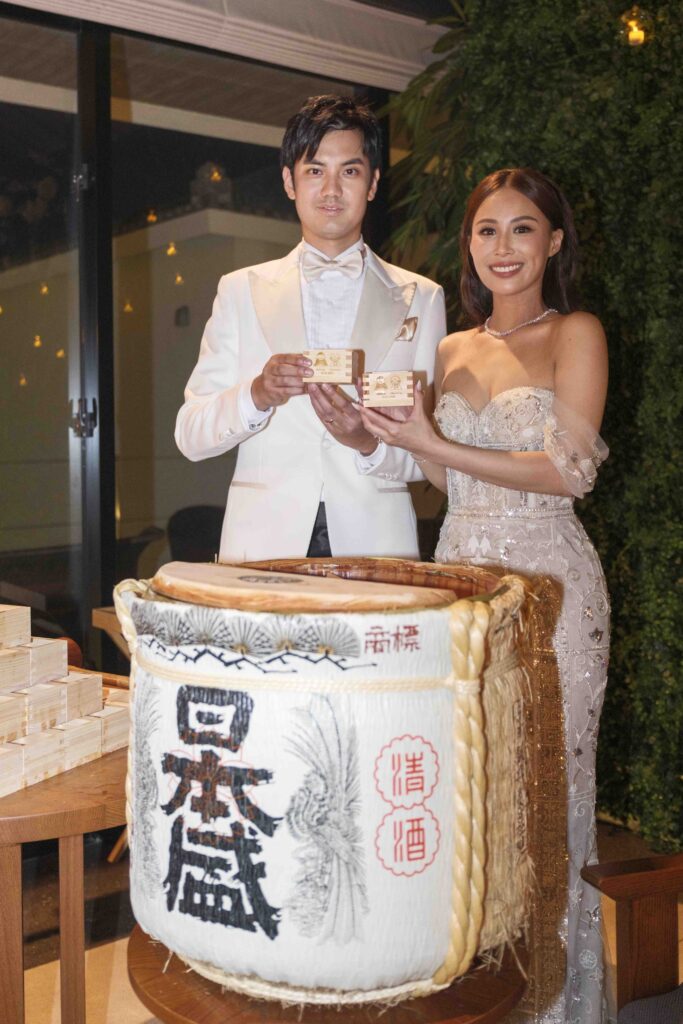 Kagami biraki sake barrel ceremony at an elegant indoor destination wedding in Okinawa, Japan
