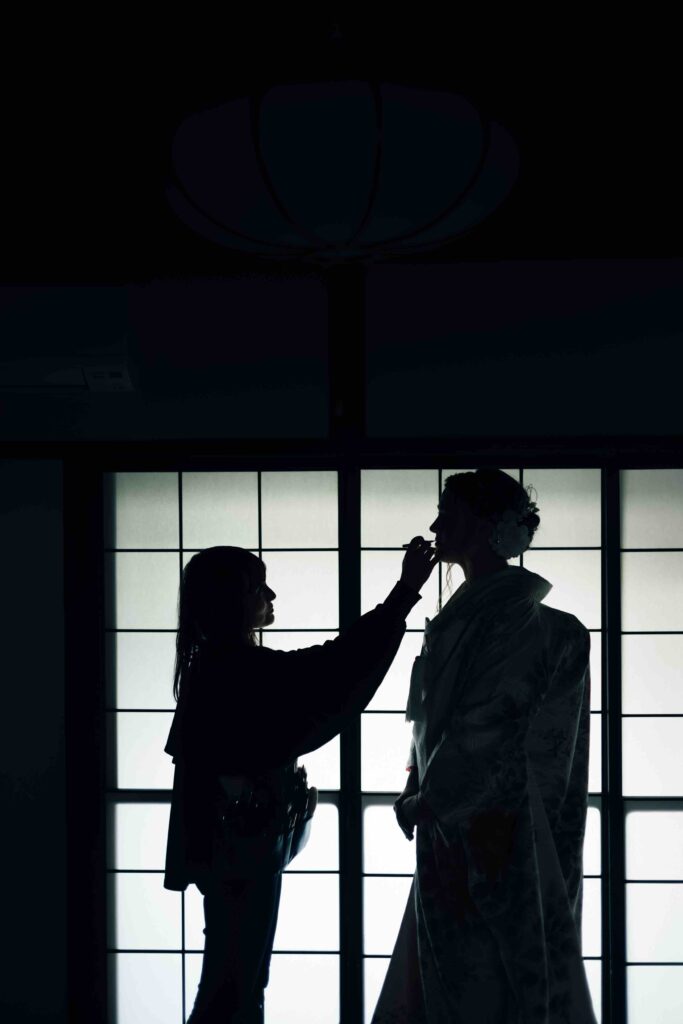 Bride getting ready for her elegant autumn wedding in Kyoto