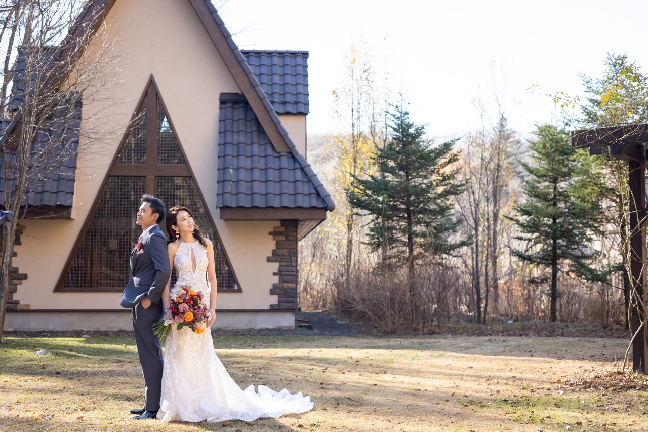Bride and groom posing outdoors at a luxury wedding in Japan